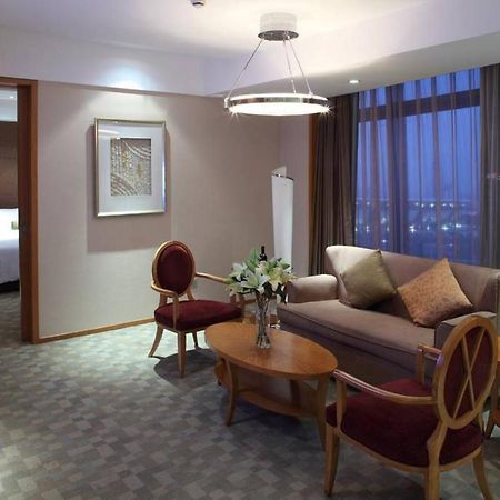 New City Garden Hotel Szucsou Szoba fotó